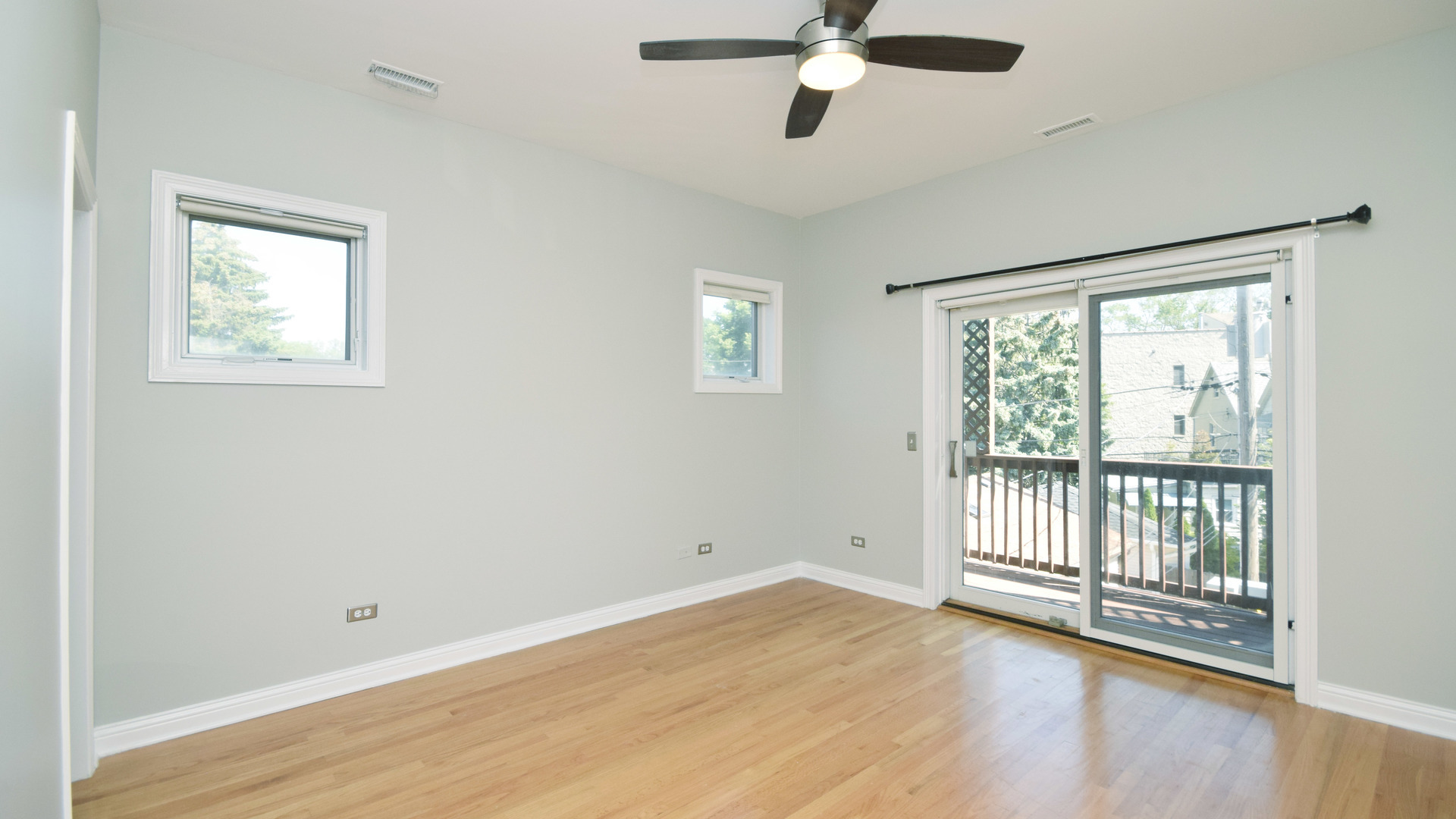 6065 North Ridge Avenue, Unit 2 Chicago, IL 60660 - Photo 8 of 17 a view of empty room with wooden floor and fan