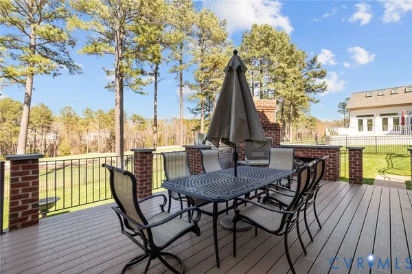 an aerial view of residential houses with outdoor space and swimming pool