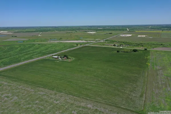 a view of a lake with a big yard