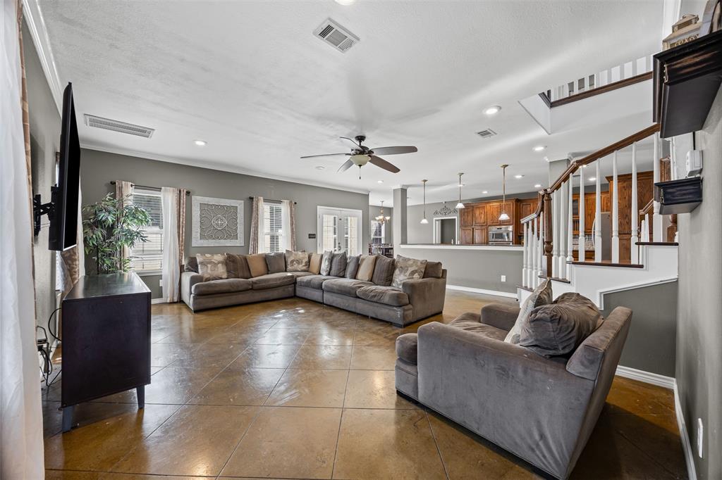 905 Royse Ridge Road Ennis, TX 75119 - Photo 11 of 38 a living room with furniture and a large window