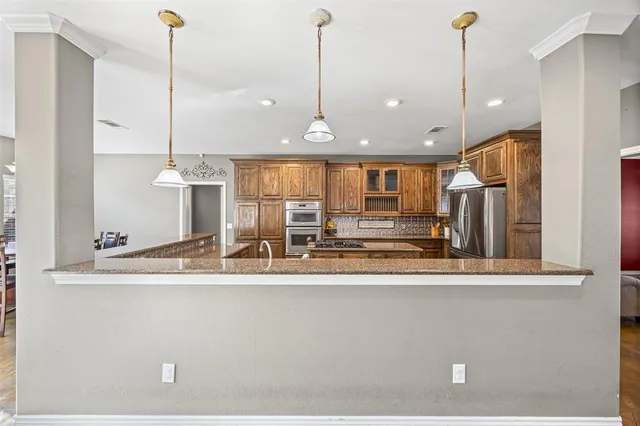 a view of a center island in the kitchen