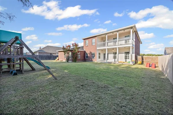 a view of a house with a park
