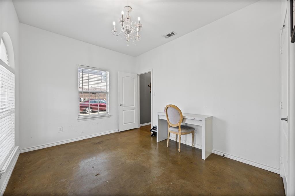 905 Royse Ridge Road Ennis, TX 75119 - Photo 10 of 38 a view of a chandelier in a room