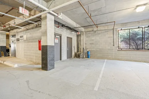 a view of a room with wooden walls