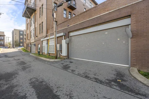 a view of a house with a street