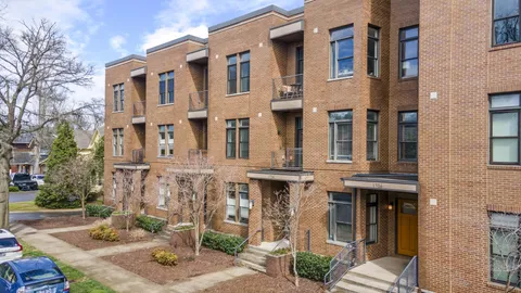 a front view of a multi story residential apartment building