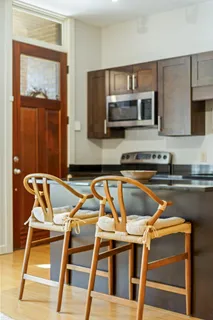 a kitchen with a stove and a microwave