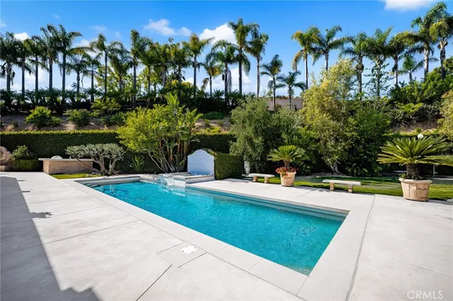 a large bathroom with a large tub and sink