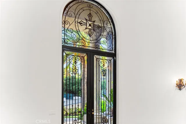 a room with furniture and a large window