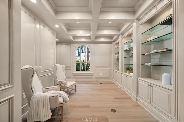 a kitchen with stainless steel appliances granite countertop a stove a sink dishwasher a refrigerator and a oven with wooden floor