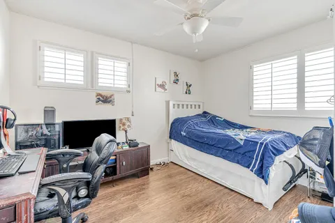 a living room with furniture window and a fireplace