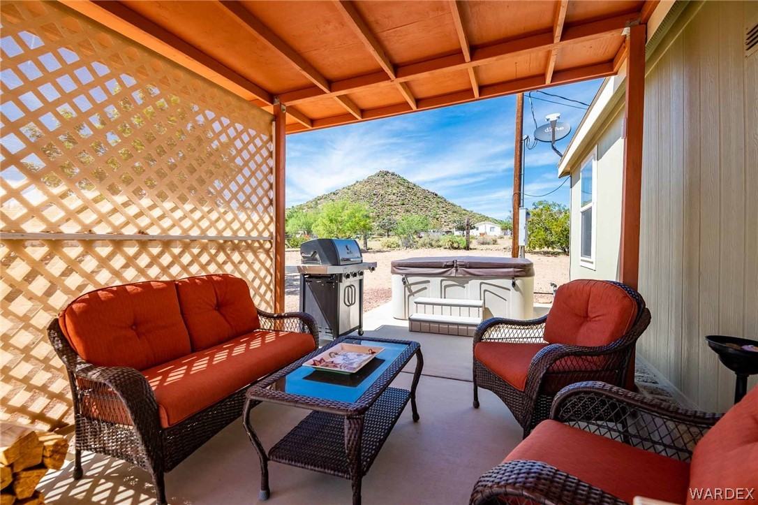 3285 Kelvin Road Golden Valley, AZ 86413 - Photo 38 of 43 a outdoor living space with patio furniture
