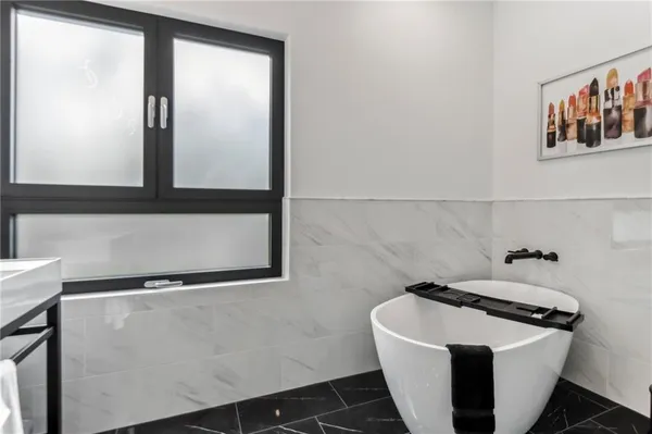 a bathroom with a bathtub