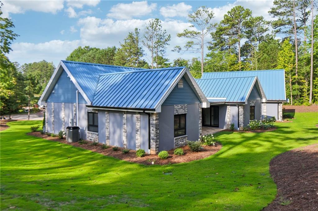40 Red Oak Circle Buchanan, GA 30113 - Photo 34 of 39 a view of a house with a yard and sitting area