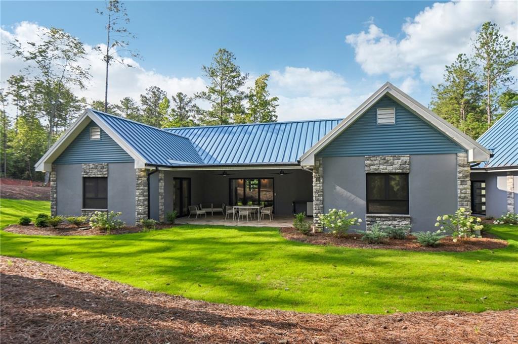 40 Red Oak Circle Buchanan, GA 30113 - Photo 35 of 39 a front view of house with yard and green space