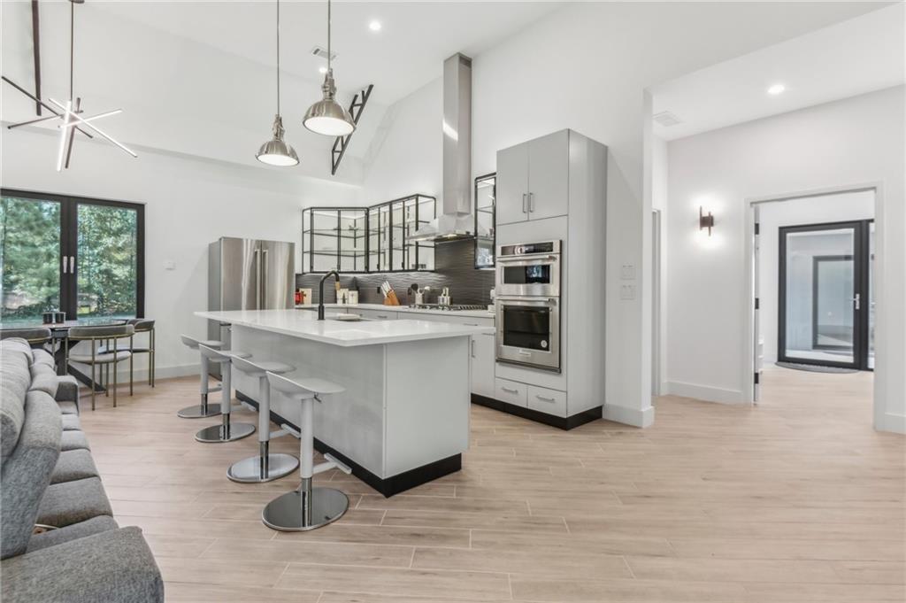 40 Red Oak Circle Buchanan, GA 30113 - Photo 9 of 39 a room with lots of wooden furniture and a chandelier