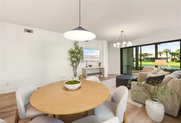 a view of a dining room with furniture