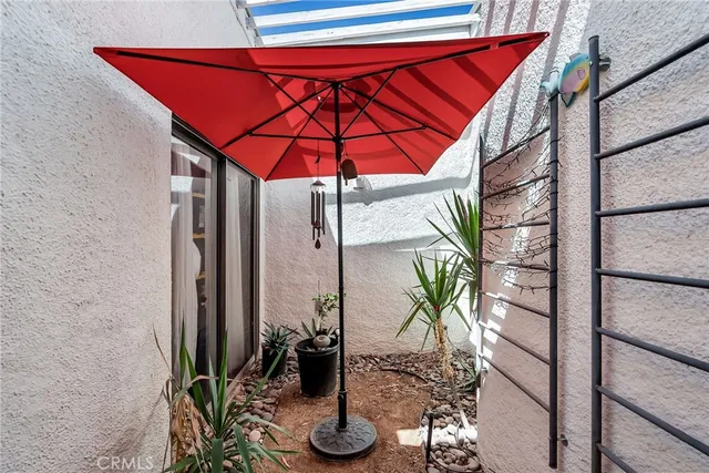 a house view with a potted plant