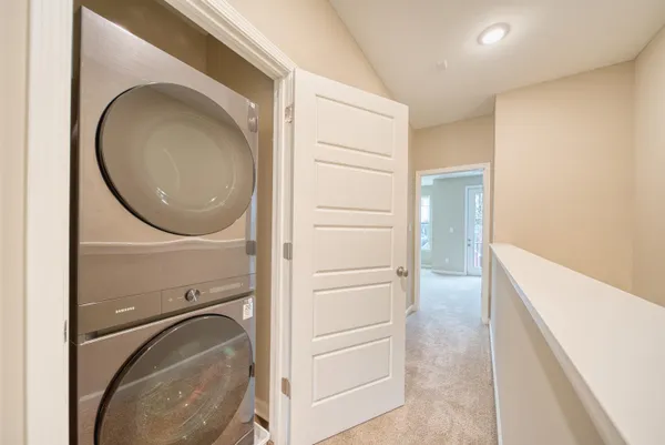 a view of a hallway with closet area