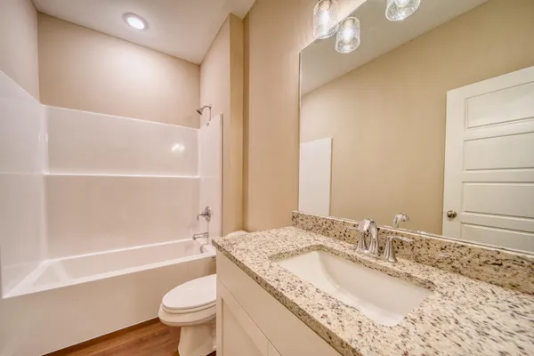 a bathroom with a bathtub