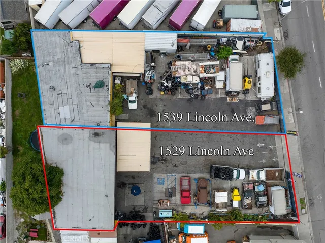 a view of multiple houses with swimming pool