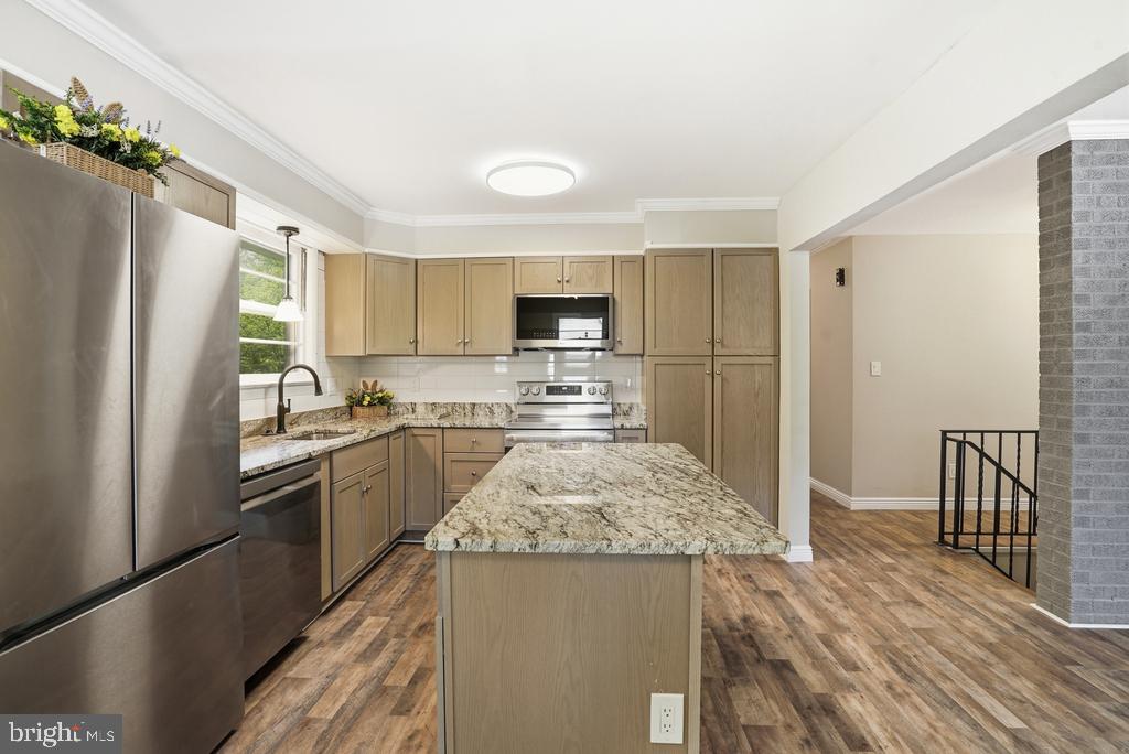 309 Cedar Ridge Drive Oxon Hill, MD 20745 - Photo 16 of 45 Modern kitchen with sleek finishes.