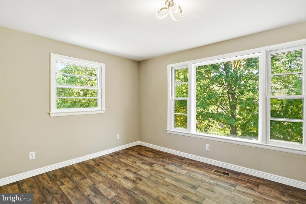 309 Cedar Ridge Drive Oxon Hill, MD 20745 - Photo 19 of 45 Bright and airy room with nature views.