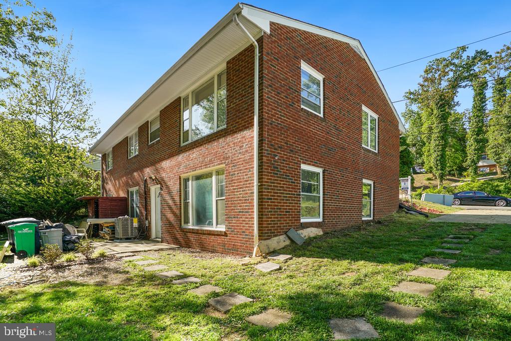309 Cedar Ridge Drive Oxon Hill, MD 20745 - Photo 2 of 45 Charming brick home with lush surroundings.
