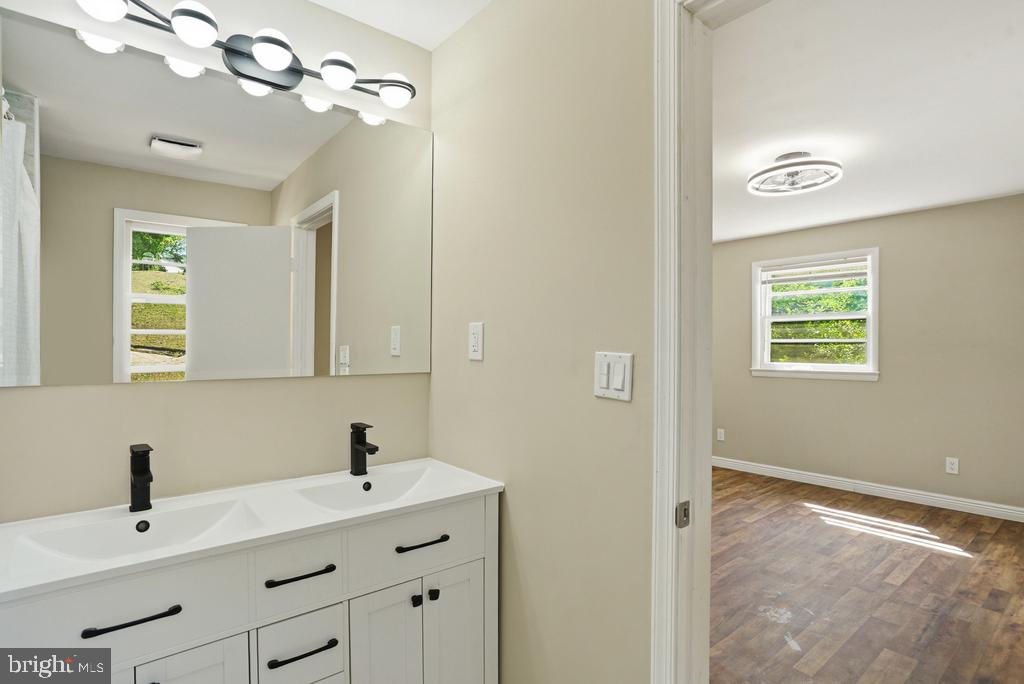 309 Cedar Ridge Drive Oxon Hill, MD 20745 - Photo 31 of 45 Modern bathroom with natural light.