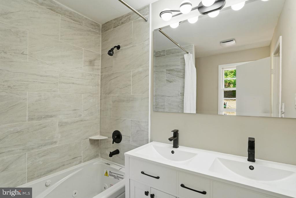 309 Cedar Ridge Drive Oxon Hill, MD 20745 - Photo 32 of 45 Modern bathroom with sleek finishes.