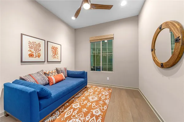 a living room with furniture and a window