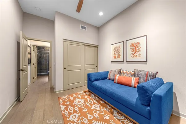 a living room with furniture and a rug