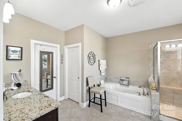 a bedroom with bed and tv