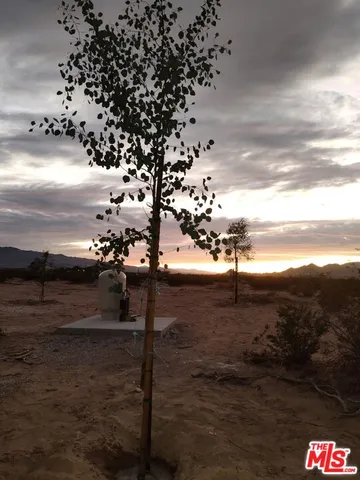 a view of ocean view with wooden fence
