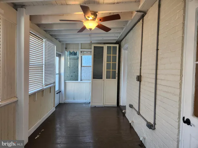 a view of an entryway with a chandelier