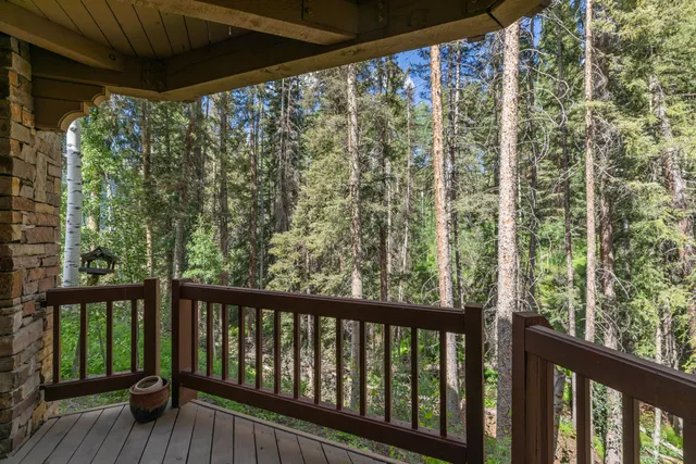 a view of a garden from a balcony