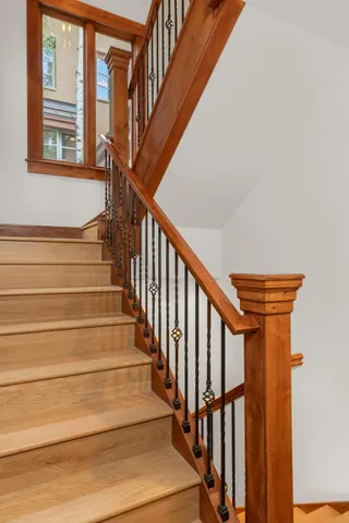 a view of backyard with plants and outdoor seating