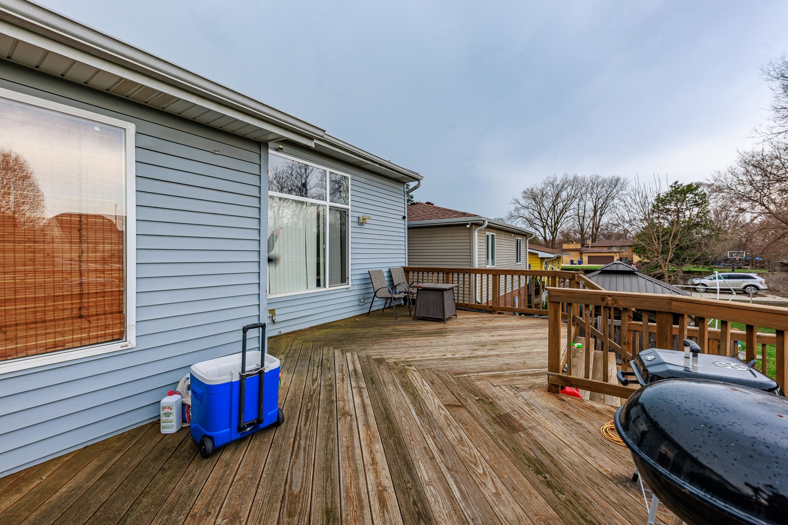 3022 141st Place Blue Island, IL 60406 - Photo 25 of 31 a balcony with wooden floor table and chairs