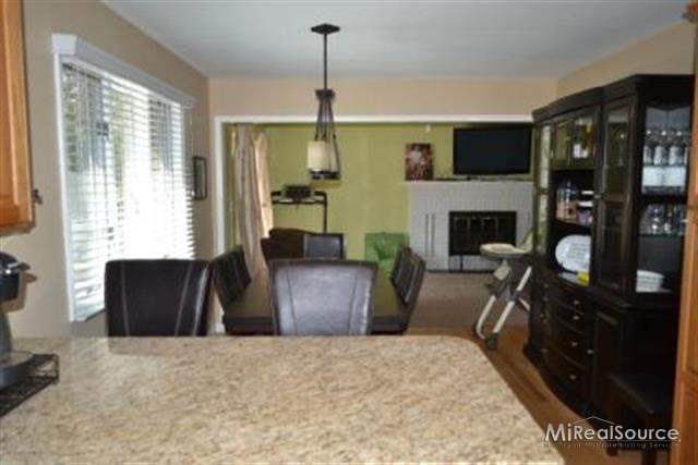 314 Old Perch Road Rochester, MI 48309 - Photo 10 of 27 A great place to entertain family and friends, the kitchen overlooks the dining area.