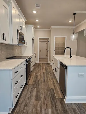 a room with window wooden floor and windows