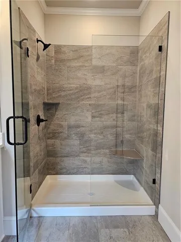 a view of a hallway with a chandelier