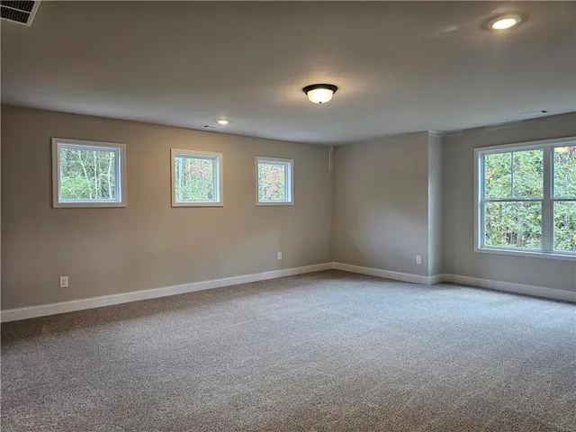 an empty room with window