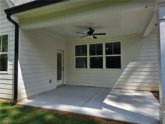 a view of a backyard of the house