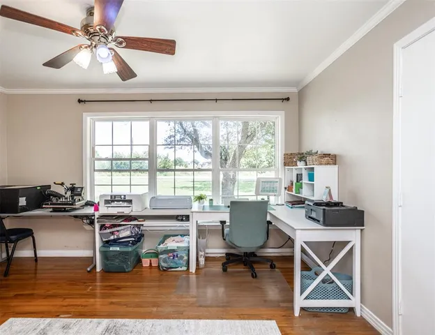 a workspace with furniture and a window
