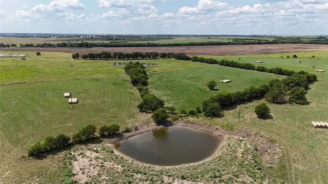 a view of a lake with a house