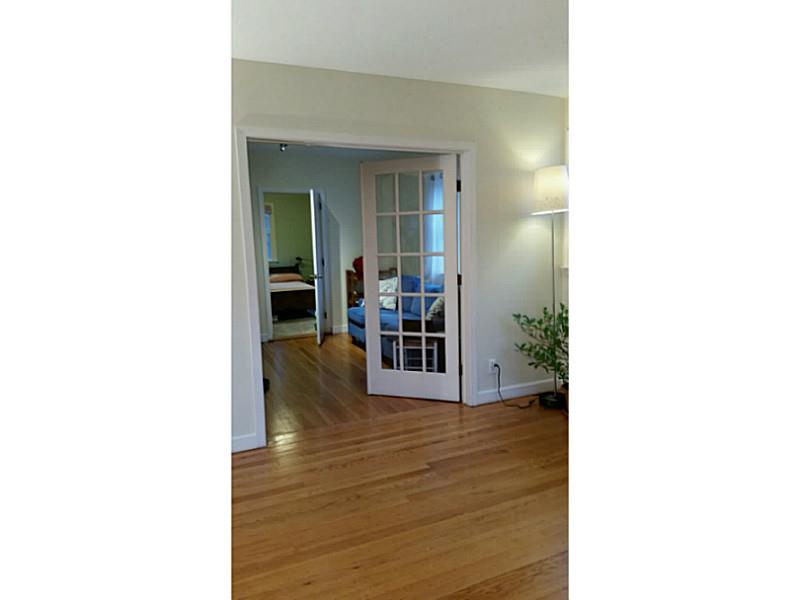 76 Meadowbrook Road East Greenwich, RI 02818 - Photo 12 of 17 Den/Family/Great Room. denwith lavette and closet is seen beyond french doors and master bed is seen at rear.