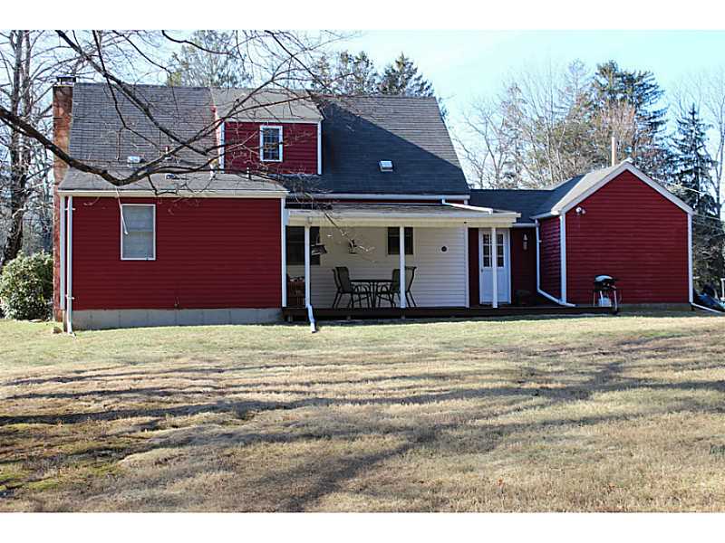 Exterior Back. large covered deck off kitchen.
