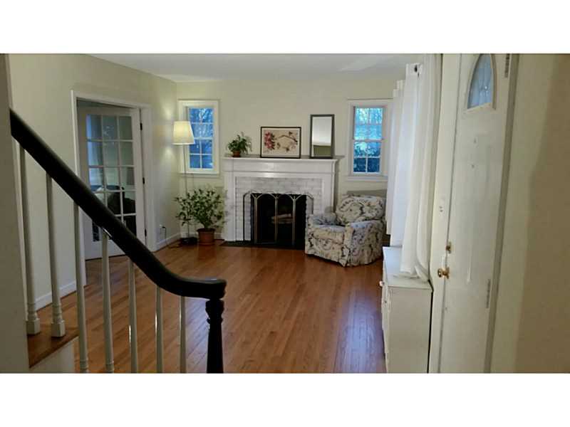 Living Room. So pretty and well proportioned. French doors at left go to den/sitting room lavette and then Master bed with full bath and walk in closet