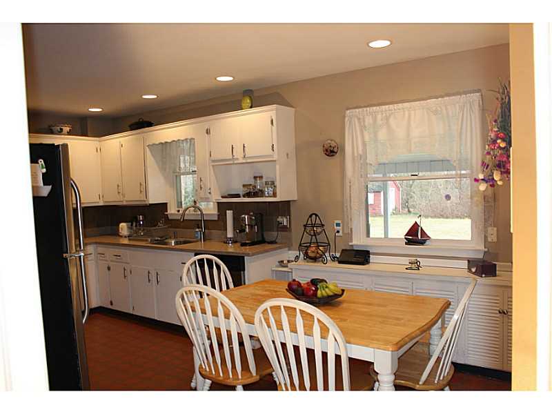 Kitchen. Spacious  kitchen with built in china cabinet and desk not shown but to right in alcove.