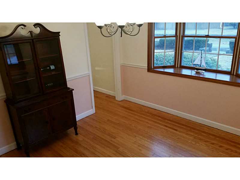 Dining Room. Formal dining room  is located off large, farm style eat in kitchen with built in desk and china cabinet